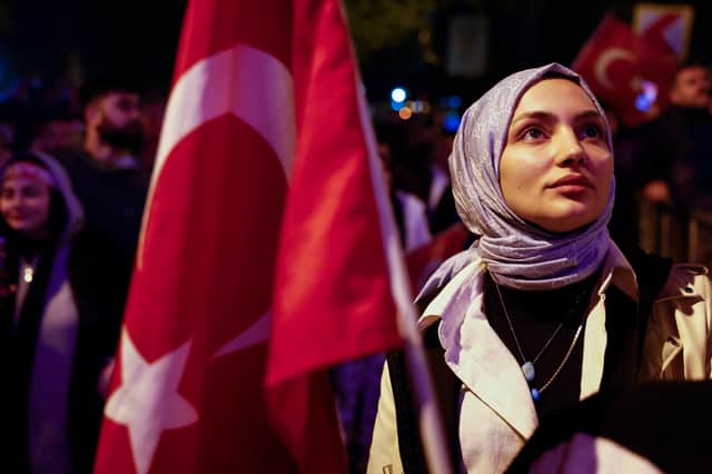 Supporters of Turkish President Recep Tayyip Erdogan celebrate at the AK Party headquarters in Istanbul (Photo: Jeff J Mitchell/Getty Images)