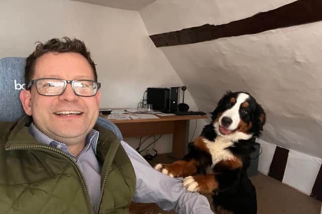 Lawrie Chandler, director of financial adviser business, Edale, with his dog, 10-month-old bernese mountain dog Artos.