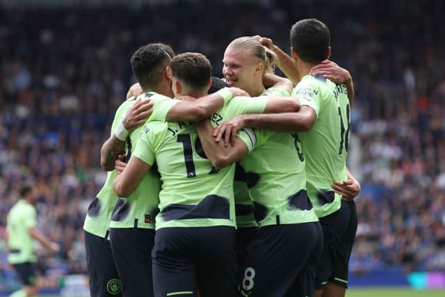 Erling Haaland celebrates after scoring Man City’s second goal against Everton