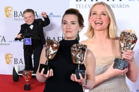 Lenny Rush, Kate Winslet, and Anne-Marie Duff with their BAFTAs after the 2023 TV BAFTA ceremony (Credit: Getty Images)