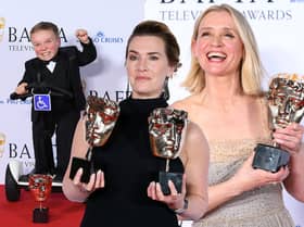 Lenny Rush, Kate Winslet, and Anne-Marie Duff with their BAFTAs after the 2023 TV BAFTA ceremony (Credit: Getty Images)