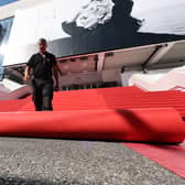 Alain Mare rolls out the red carpet ahead of the 76th annual Cannes film festival at  on May 16, 2023 in Cannes, France. (Photo by Mike Coppola/Getty Images)