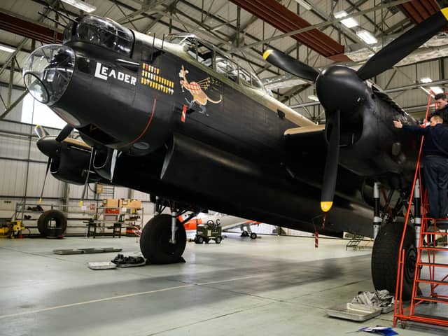 Members of the ground crew work on one of two surviving airworthy Avro Lancaster bombers ahead of an event to mark the 75th anniversary of the Dambusters raids at RAF Coningsby in 2018 (Photo: Leon Neal/Getty Images)