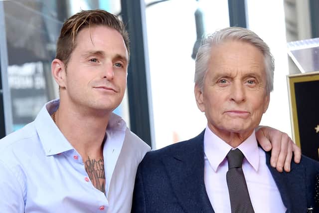 Cameron Douglas and Michael Douglas pose at the Michael Douglas Star On The Hollywood Walk Of Fame ceremony on November 6, 2018 in Hollywood, California.  (Photo by Gregg DeGuire/Getty Images)