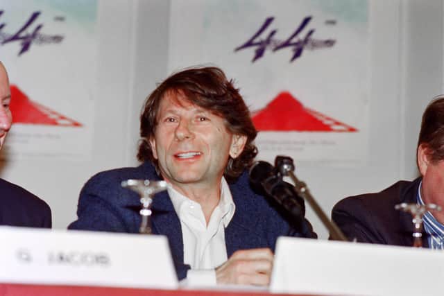Polish-born filmmaker Roman Polanski smiles on April 18, 1991 during a press conference concerning this year's Cannes Film Festival. (Photo by FrÃ©dÃ©ric HUGON / AFP) (Photo by FREDERIC HUGON/AFP via Getty Images)