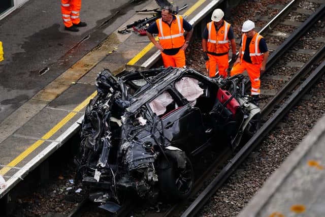 The mangled Range Rover ended up on a railway track for the Piccadilly underground line in west London (Photo: Victoria Jones/PA Wire)