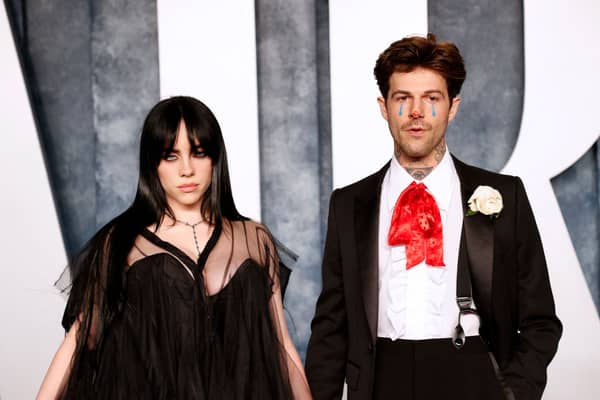 US singer-songwriter Billie Eilish (L) and US singer and actor Jesse Rutherford attends the Vanity Fair 95th Oscars Party at the The Wallis Annenberg Center for the Performing Arts in Beverly Hills, California on March 12, 2023. (Photo by Michael TRAN / AFP) (Photo by MICHAEL TRAN/AFP via Getty Images)