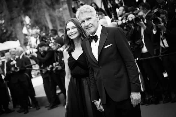 Calista Flockhart and Harrison Ford attend the "Indiana Jones And The Dial Of Destiny" red carpet during the 76th annual Cannes film festival at Palais des Festivals on May 18, 2023 in Cannes, France. (Photo by Vittorio Zunino Celotto/Getty Images)