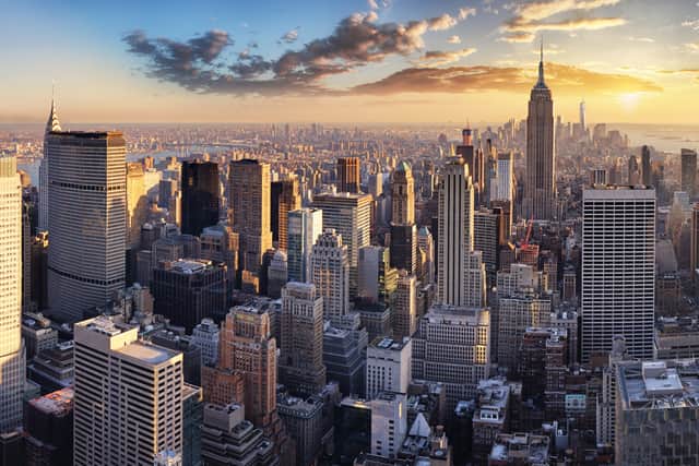 A new study published by Earth's Future found that the 1.68 trillion-pound weight of its skyscrapers and other buildings is weighing down New York City - Credit: Adobe
