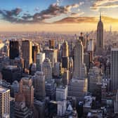 A new study published by Earth's Future found that the 1.68 trillion-pound weight of its skyscrapers and other buildings is weighing down New York City - Credit: Adobe