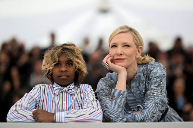 Australian actor Aswan Reid (L) and Australian actress Cate Blanchett pose during a photocall for the film "The New Boy" at the 76th edition of the Cannes Film Festival in Cannes, southern France, on May 19, 2023. (Photo by Patricia DE MELO MOREIRA / AFP) (Photo by PATRICIA DE MELO MOREIRA/AFP via Getty Images)