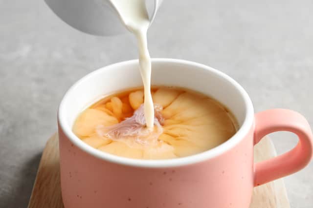 Scientist reveals if you should put your milk in first or last in your cup of tea.
