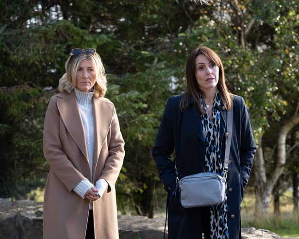 Suranne Jones as Becca and Eve Best as Rosaline in Maryland, stood in front of some trees (Credit: ITV/Eoin Holland)