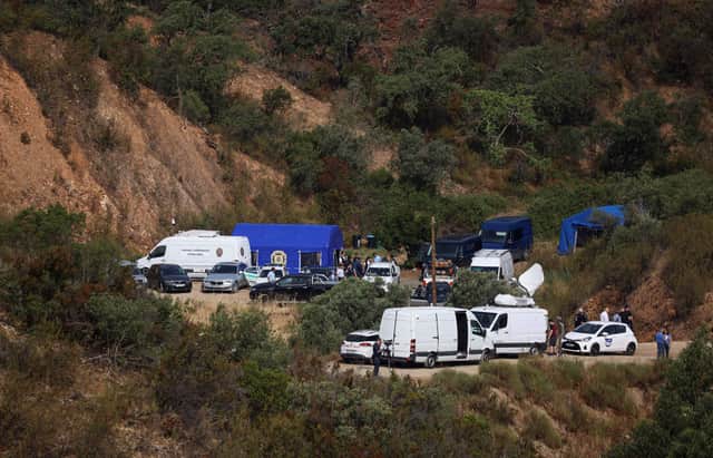 Portuguese authorities from the Judicial Police criminal investigation unit work during a new search operation amid the investigation into the disappearance of Madeleine McCann at the Arade dam, in Silves, near Praia da Luz, on 23 May, 2023. (Photo by FILIPE AMORIM / AFP) (Photo by FILIPE AMORIM/AFP via Getty Images)