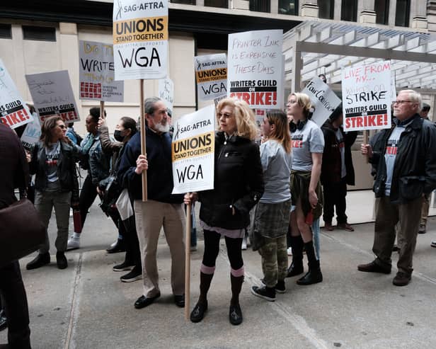 SAG-AFTRA members attend a picket in support of striking WGA members in May 2023 (Credit: Spencer Platt/Getty Images)