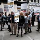 SAG-AFTRA members attend a picket in support of striking WGA members in May 2023 (Credit: Spencer Platt/Getty Images)