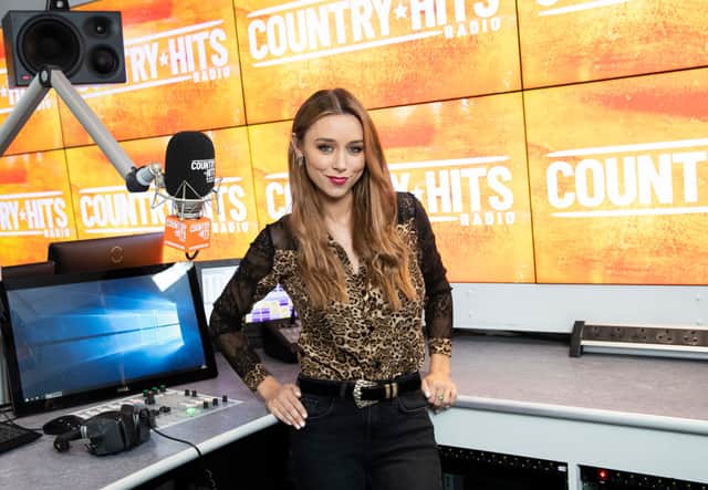 Presenter Una Healy pose for photo to annouce the launch of new station Country Hits Radio at 1 Golden Square on April 05, 2019 in London, United Kingdom. (Photo by John Phillips/Getty Images)