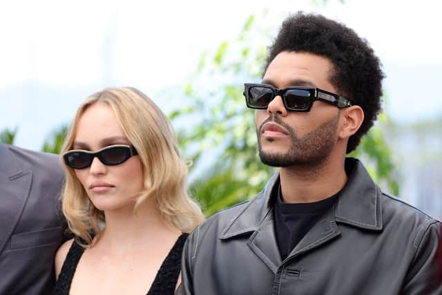 CANNES, FRANCE - MAY 23: Lily-Rose Depp and Abel 'The Weeknd' Tesfaye attend "The Idol" photocall at the 76th annual Cannes film festival at Palais des Festivals on May 23, 2023 in Cannes, France. (Photo by Andreas Rentz/Getty Images)