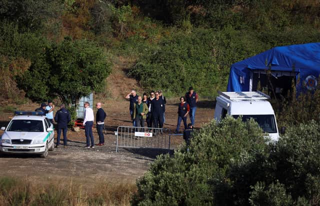Portuguese Judicial Police criminal investigation unit members prepare at the base camp near the Arade dam, in Silves, on 24 May, 2023 on the second day of a new search operation amid the investigation into the disappearance of Madeleine McCann. (Photo by FILIPE AMORIM / AFP) (Photo by FILIPE AMORIM/AFP via Getty Images)