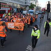 Just Stop Oil ‘slow marches’ cost Met Police £3.5m in one month. (Photo: AFP via Getty Images) 