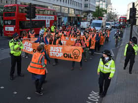 Just Stop Oil ‘slow marches’ cost Met Police £3.5m in one month. (Photo: AFP via Getty Images) 