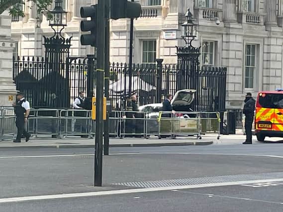 Police at the scene after a car collided with the gates of Downing Street in London. The Metropolitan Police said armed officers have arrested a man on suspicion of criminal damage and dangerous driving (Photo: Ben Hatton/PA Wire)