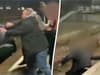 Watch: Fight between Arsenal and Tottenham fans sees man punched onto railway tracks