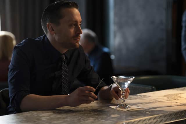 Kieran Culkin as Roman Roy in Succession, holding a martini (Credit: HBO)