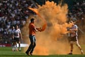 Just Stop Oil activists throw paint on Twickenham pitch