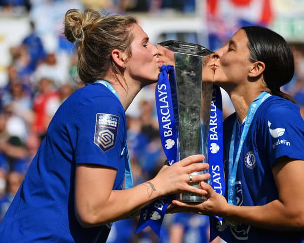 Millie Bright and Sam Kerr celebrate their WSL title, their fourth in four years