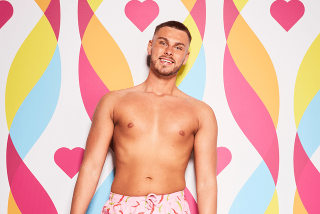Joker of the pack George Fensom will be bringing the laughs to the Love Island villa. (Credit: ITV)