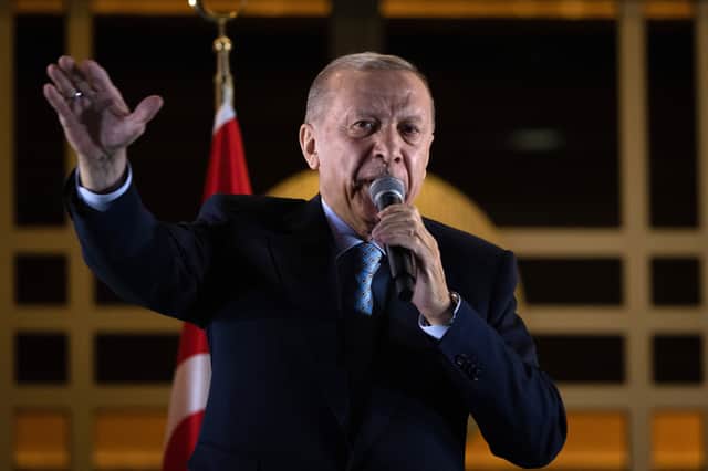 President Recep Tayyip Erdogan speaks to supporters at the presidential palace after winning re-election in a runoff (Chris McGrath/Getty Images)