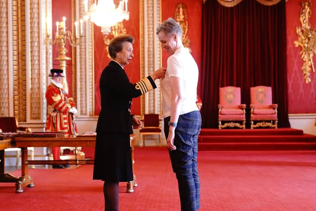 Kathleen Stock receiving her OBE from Princess Anne at Buckingham Palace 