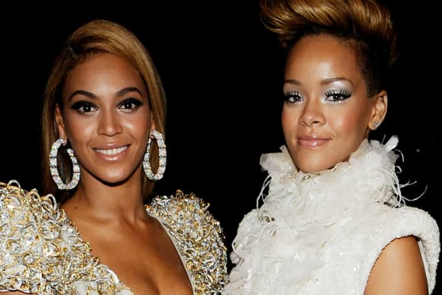 Singers Beyonce Knowles (L) and Rihanna (R) backstage during the 52nd Annual GRAMMY Awards held at Staples Center on January 31, 2010 in Los Angeles, California. (Photo by Larry Busacca/Getty Images)  