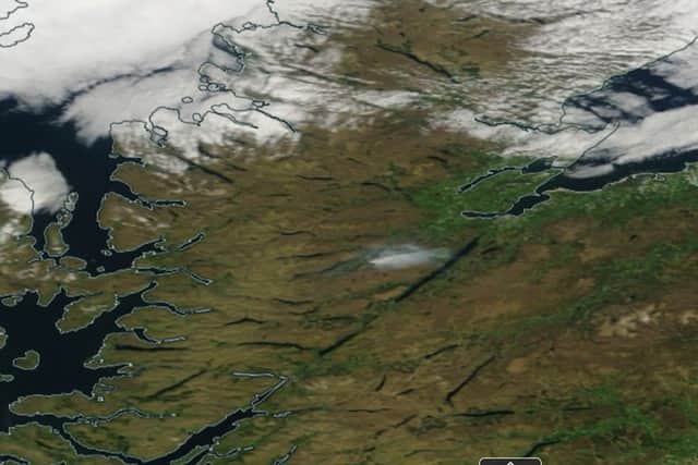 NASA's worldview satellite shows the plume of smoke (centre) from the fire at Cannich drifting towards Loch Ness on Monday amid clear skies (Photo: PA Wire)