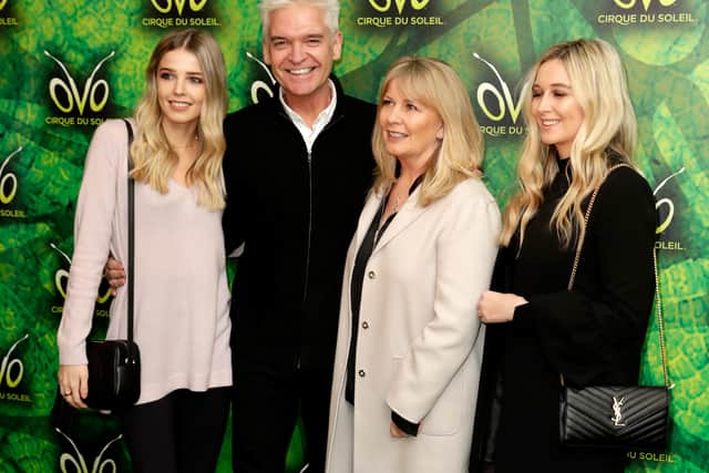 LONDON, ENGLAND - JANUARY 10:  Phillip Schofield (2ndL), his wife Stephanie Lowe (2ndR), Molly Lowe (L) and Ruby Lowe (R) attend the Cirque du Soleil OVO premiere at Royal Albert Hall on January 10, 2018 in London, England.  (Photo by John Phillips/Getty Images)
