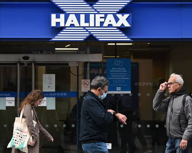 Lloyds Banking Group is shuttering 53 branches across its high street brands, including Halifax (image: AFP/Getty Images)