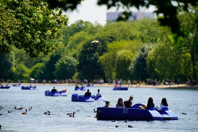 People ride pedalo and rowing boats in the hot weather on the Serpentine in Hyde Park, in London. The UK could experience the hottest day of the year so far, with temperatures potentially reaching a balmy 26C. Picture date: Saturday June 3, 2023. Credit: Aaron Chown/PA Wire
