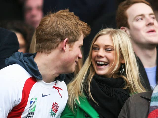 Britain's Prince Harry and Chelsy Davy laugh before the game between South Africa and England at the Investec Challenge international rugby match at Twickenham, west of London on November 22, 2008. AFP PHOTO / Chris Ratcliffe (Photo credit should read CHRIS RATCLIFFE/AFP via Getty Images)
