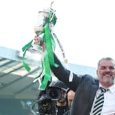 Angelos Postecoglou lifts the Scottish Cup after winning with Celtic