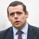 Scottish Tory leader Douglas Ross has been branded a "pantomime villain" after he criticised a library in his constituency for hosting a drag queen 'storytime' event. (Credit: Getty Images)