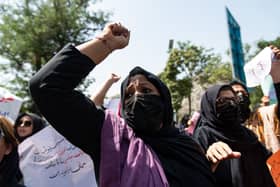 Taliban fighters fired into the air as they dispersed a rare rally by women who were protesting in front of the education ministry building, days ahead of the first anniversary of the hardline Islamists’ return to power, on August 13, 2022 in Kabul, Afghanistan. Credit: Nava Jamshidi/Getty Images