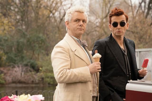 Michael Sheen as Aziraphale and David Tennant as Crowley in Good Omens, eating ice cream (Credit: Chris Raphael/Amazon Studios)
