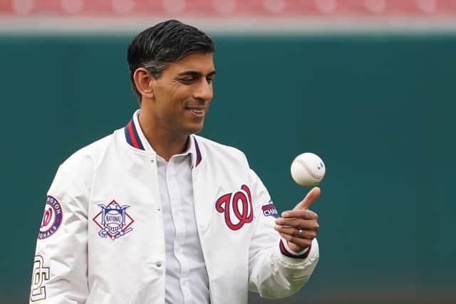 Rishi Sunak tossed a baseball at a Washington Nationals match during his visit to the US capital