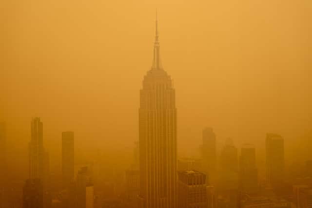 Smoky haze from wildfires in Canada diminishes the visibility of the Empire State Building (Photo: Getty Images)