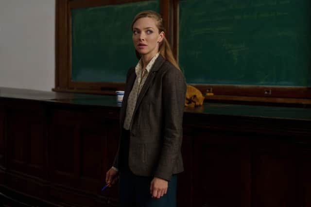 Amanda Seyfried as Ria in The Crowded Room, stood in front of a chalkboard (Credit: Apple TV+)
