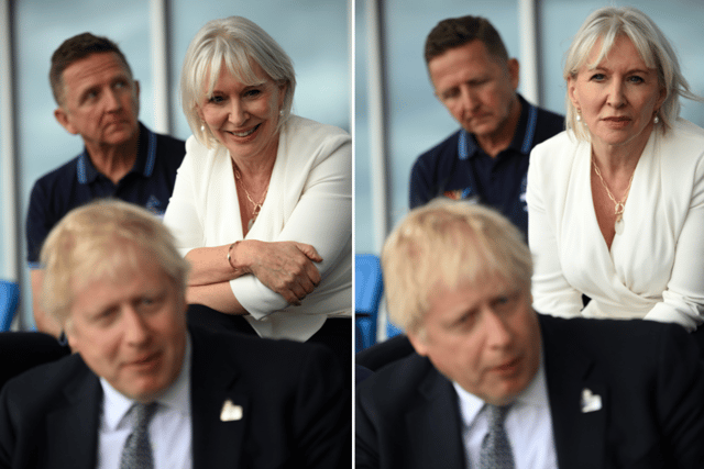 UK Culture Secretary Nadine Dorries (R) looks on as UK Prime Minister Boris Johnson speaks with baton bearers and Commonwealth Games volunteers during a visit to the stadium on May 12, 2022 in Birmingham, England. (Photo by Oli Scarff - WPA Pool/Getty Images)