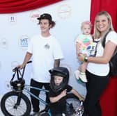 Late BMX star Pat Casey with his wife Chase and their children Reid and Taytum in 2017. Pat died in a motorcycle accident in June 2023.