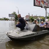 Rescue workers have been attempting to have those affected by flooding caused by the collapse of the Kakhovka dam in southern Ukraine. (Credit: Getty Images)