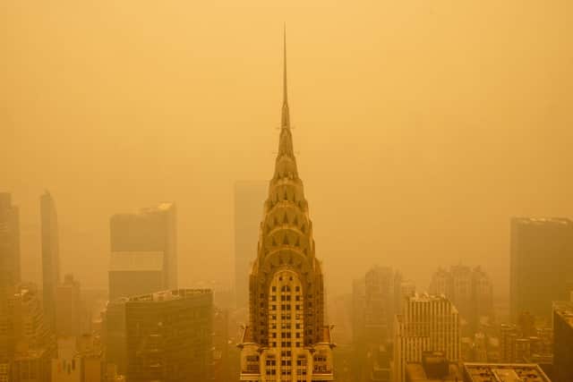 Smoky haze from wildfires in Canada diminishes the visibility of the Chrysler Building on June 7, 2023 in New York City. (Photo by David Dee Delgado/Getty Images)